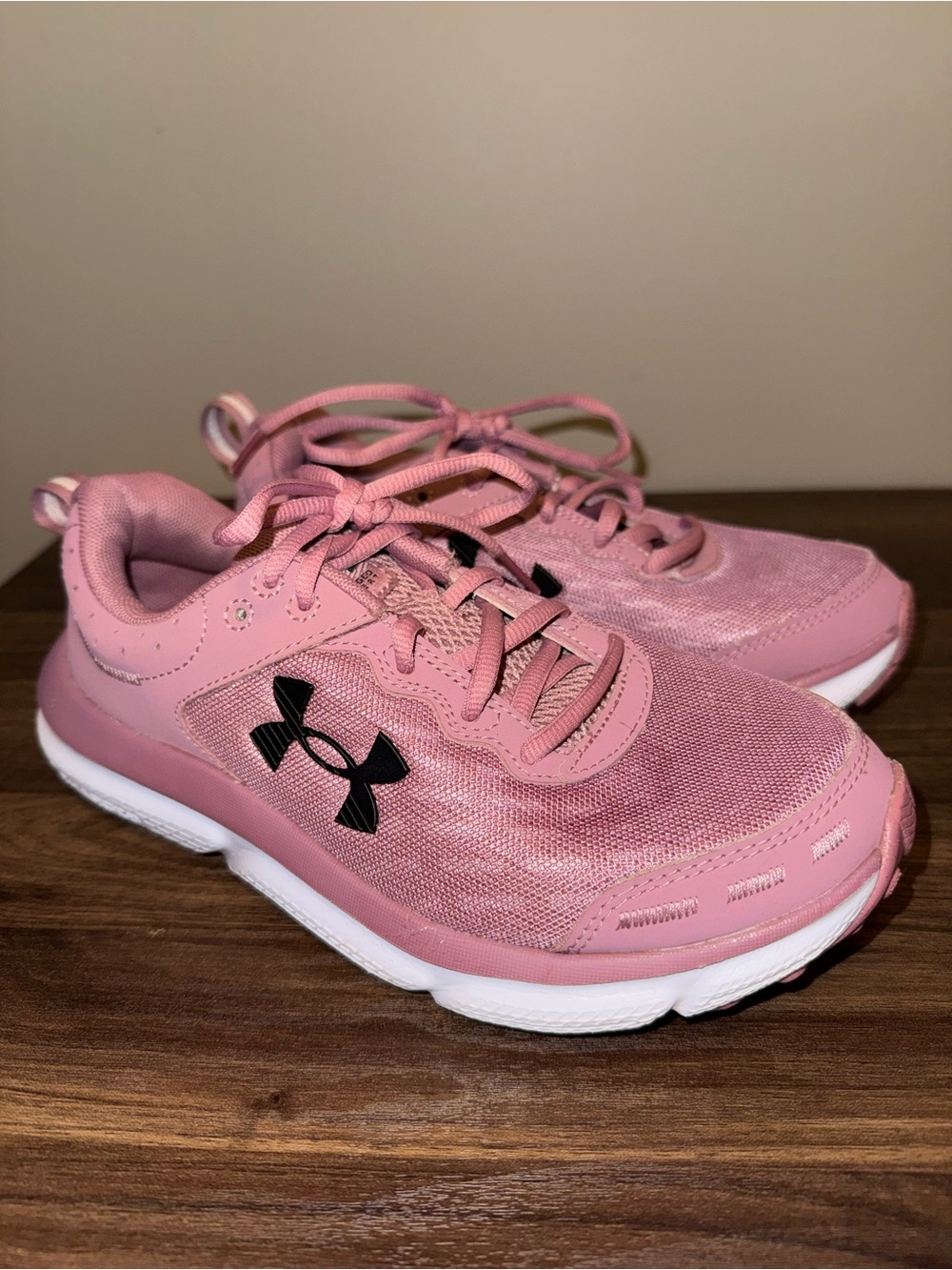 Under Armour Charged Assert 10 women’s size 7 pink shoes